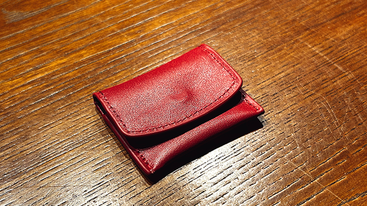 The Cowhide Coin Wallet (Red) by Bacon Magic - Trick alternate view - Wizard Magic Shop