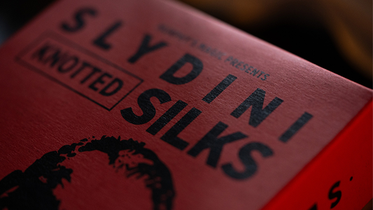 Slydini's Knotted Silks (White / 18 Inch) by Slydini & Murphy's Magic - Trick alternate view - Wizard Magic Shop