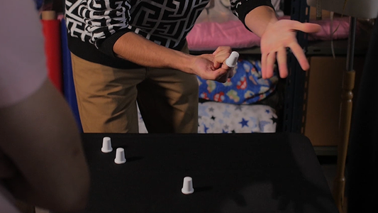 The Flying Thimbles (Gimmick and Online Instructions) by Vernet Magic - Trick alternate view - Wizard Magic Shop