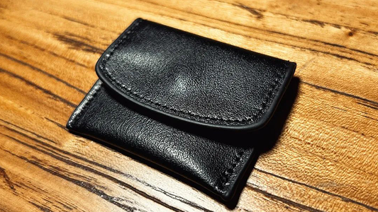 The Cowhide Coin Wallet (Black) by Bacon Magic - Trick alternate view - Wizard Magic Shop