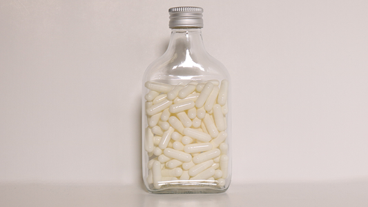 The Bottle (Ungimmicked Bottle and Pills only) by Adrian Vega - Wizard Magic Shop